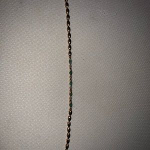 Emerald and diamond 14 karat gold bracelet.